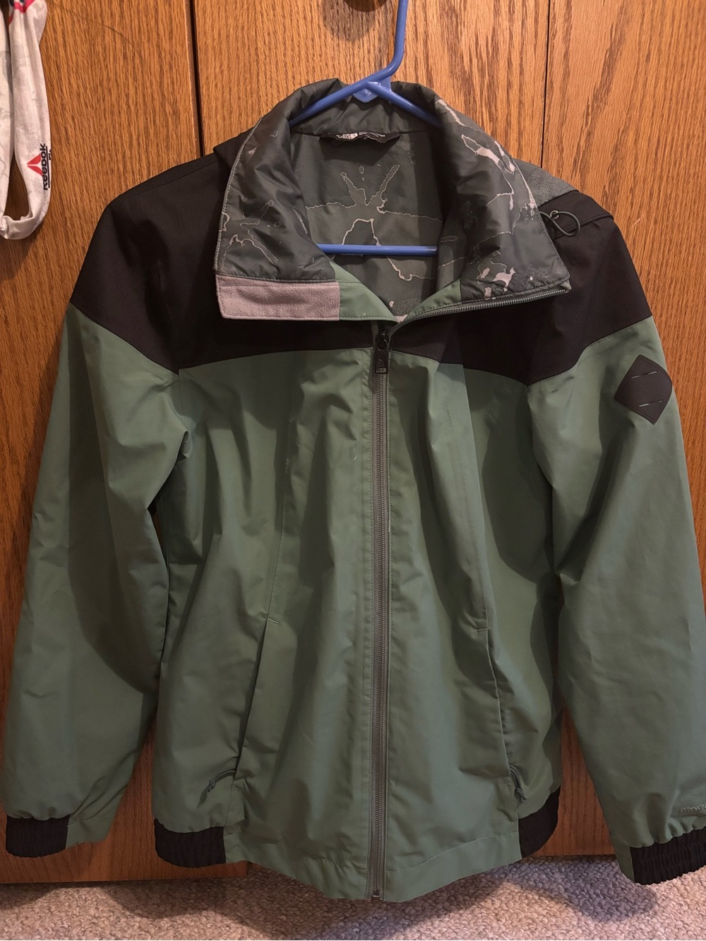 The North Face Olive Green and Black Women’s Rain Jacket
